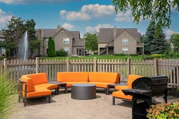 Patio with orange couches